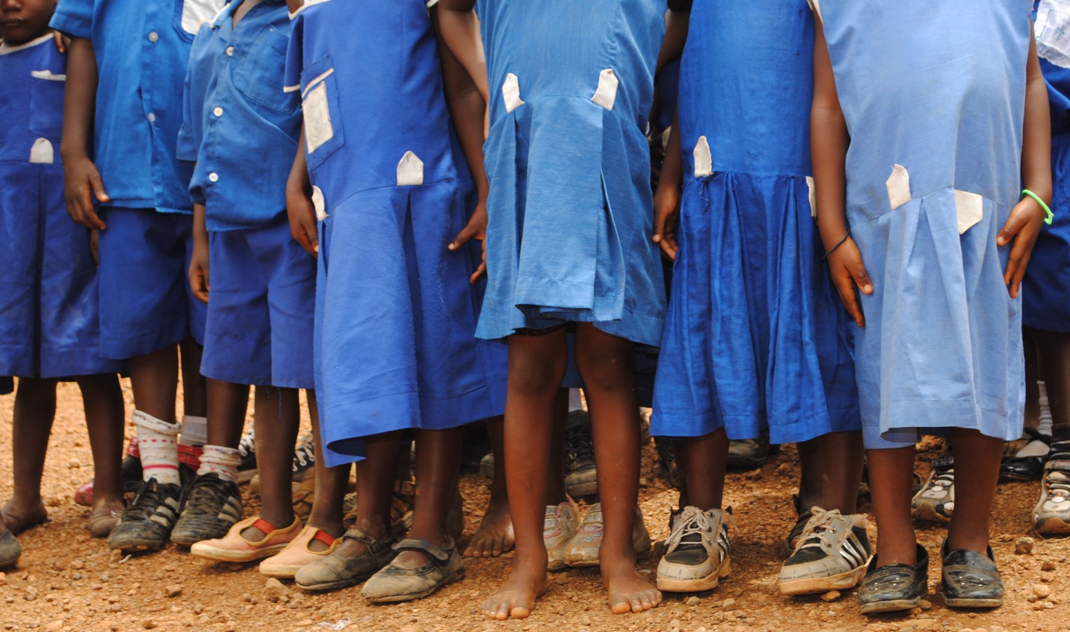 Most children either do not have shoes to wear at all or wear incorrect type and size shoes. Photo taken at Church of Christ Primary School, Regent Village