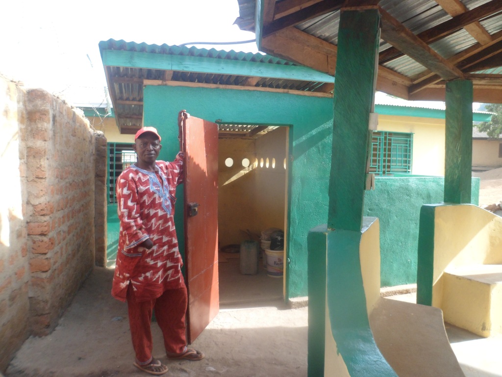 Chairman inspecting newly constructed school store