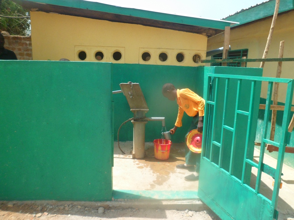 Collecting water for the well to the class