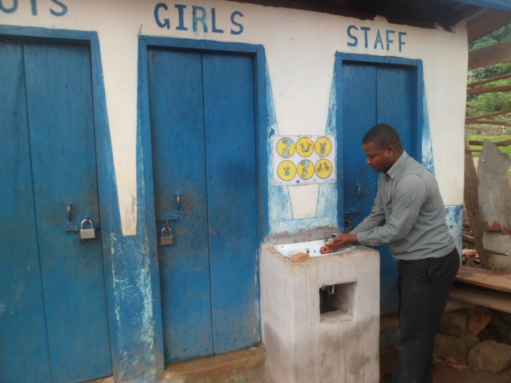 Hand washing after toilet by head teacher