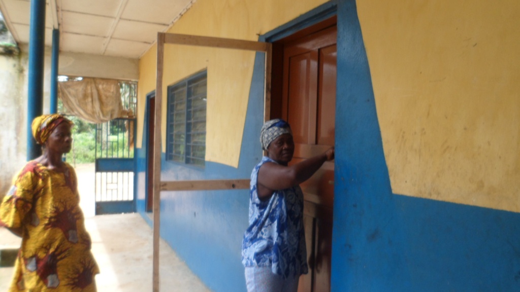 Rehabilitated class room door with new lock & guide