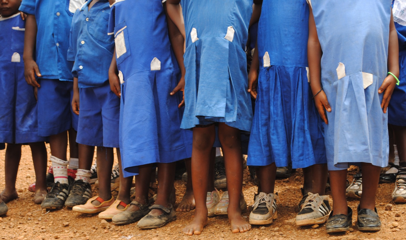 Most children either do not have shoes to wear or wear incorrect type and size shoes. Photo taken at Church of Christ Primary School, Regent Village